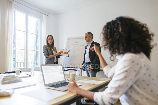 focused_174704078-stock-photo-business-people-having-team-meeting.jpeg